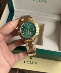ROLEX DAYTONA GOLD GREEN