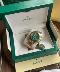 Alternative view of ROLEX DAYTONA GOLD GREEN
